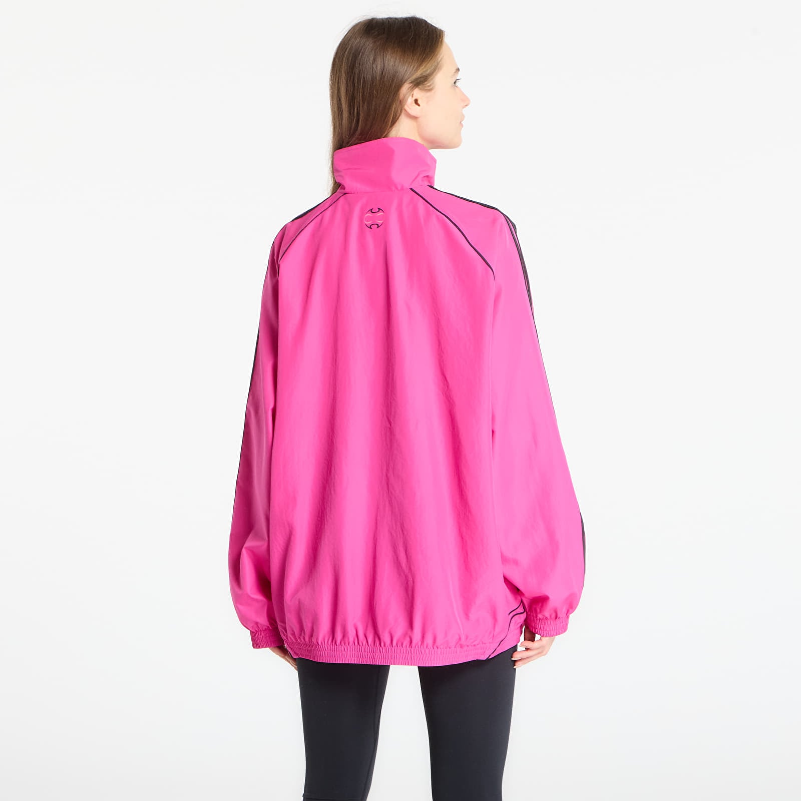 Jackor för kvinnor adidas Teamgeist Adicolor Oversized Woven Track Top Semi Lucid Fuchsia/ Better Scarlet/ Off White