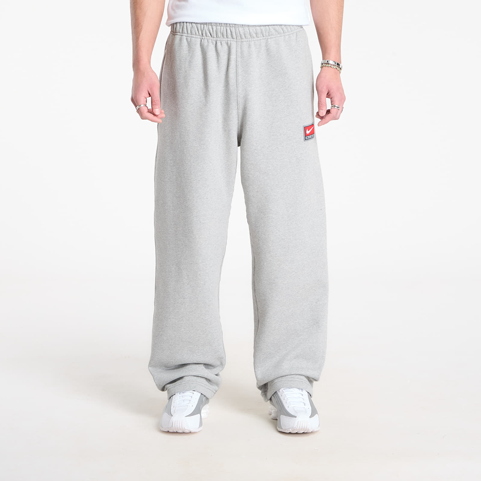 Herren-Sweatpants Nike Solo Swoosh Men's Fleece Open-Hem Pants Dk Grey Heather/ White