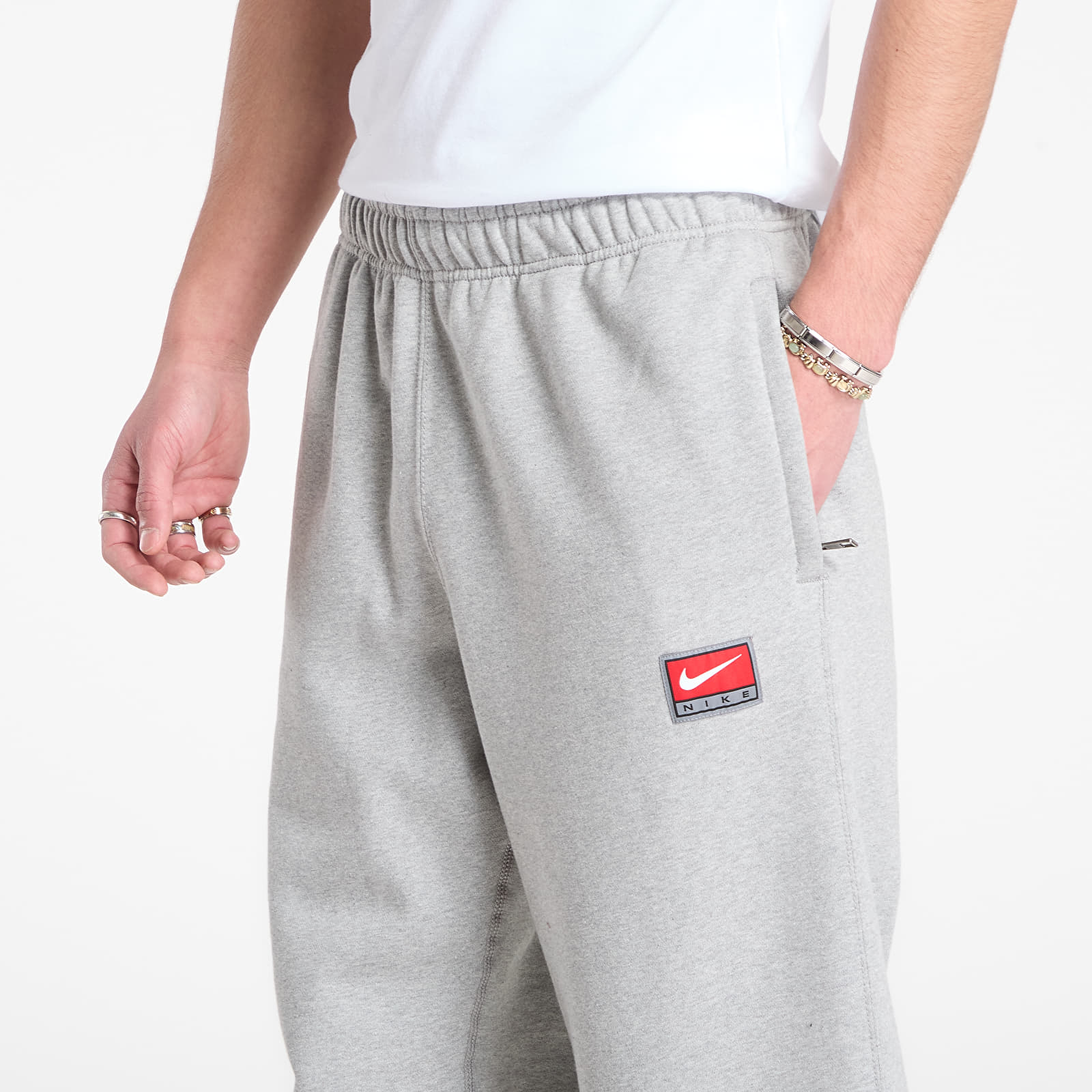 Herren-Sweatpants Nike Solo Swoosh Men's Fleece Open-Hem Pants Dk Grey Heather/ White