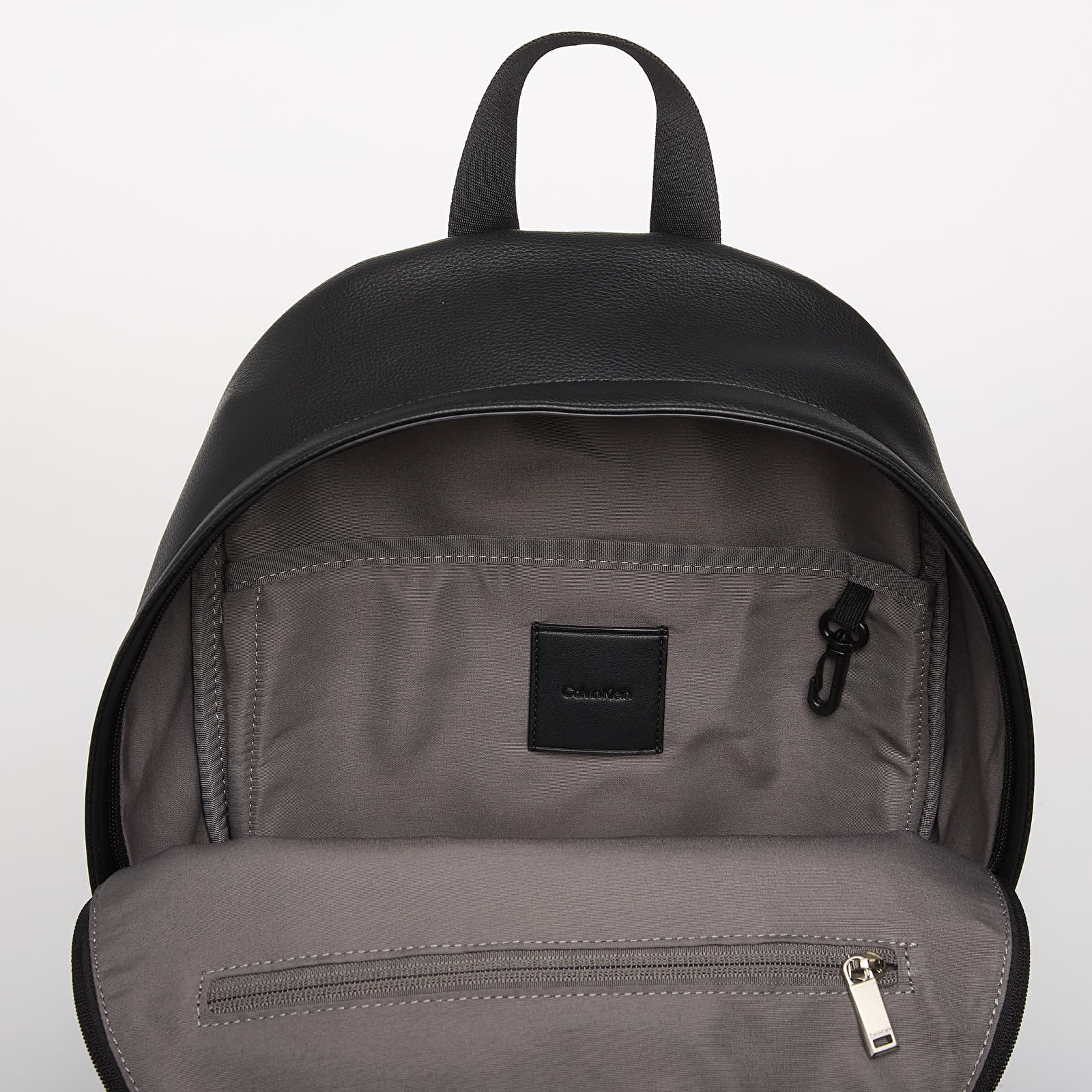 Batohy Calvin Klein Emblem Aop Emboss Round Backpack Black