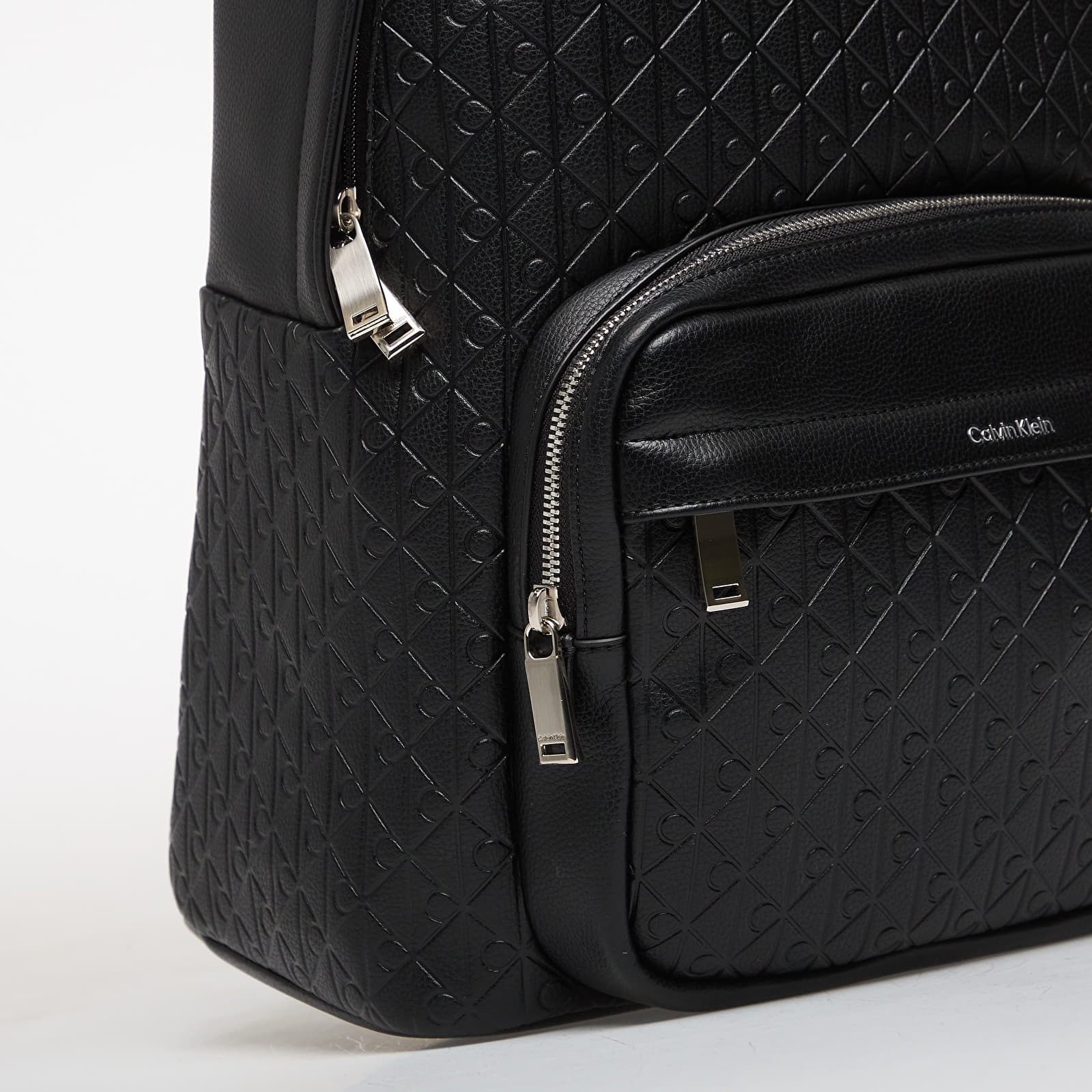 Batohy Calvin Klein Emblem Aop Emboss Round Backpack Black