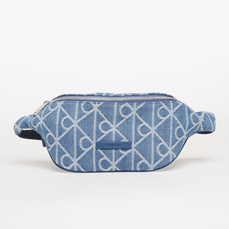 Borsetă Calvin Klein Emblem Aop Denim Waistbag Blue
