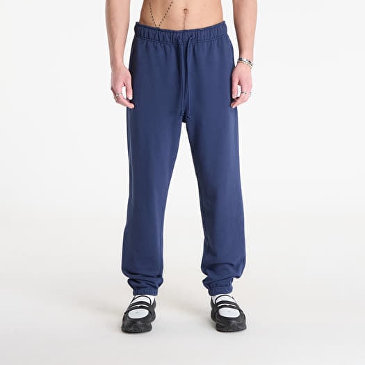Trenirka New Balance Athletics French Terry Jogger Navy