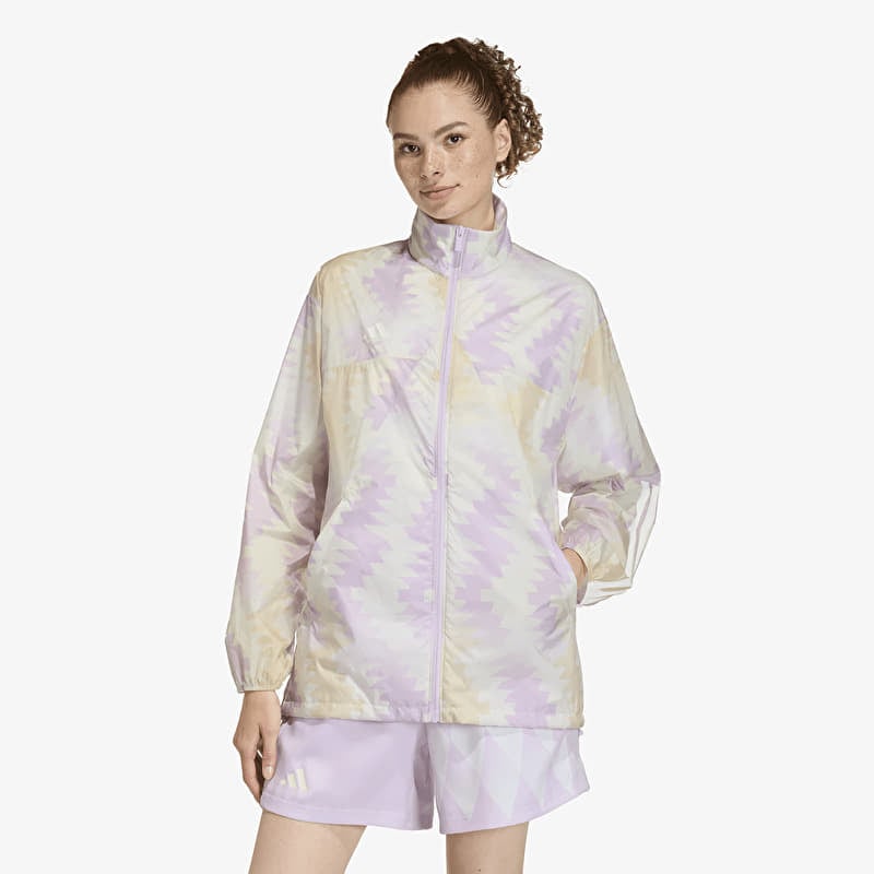 Giacca adidas House Of Tiro x Common Goal AOP Windbreaker Wonder White/ Off White/ Ice Lavender