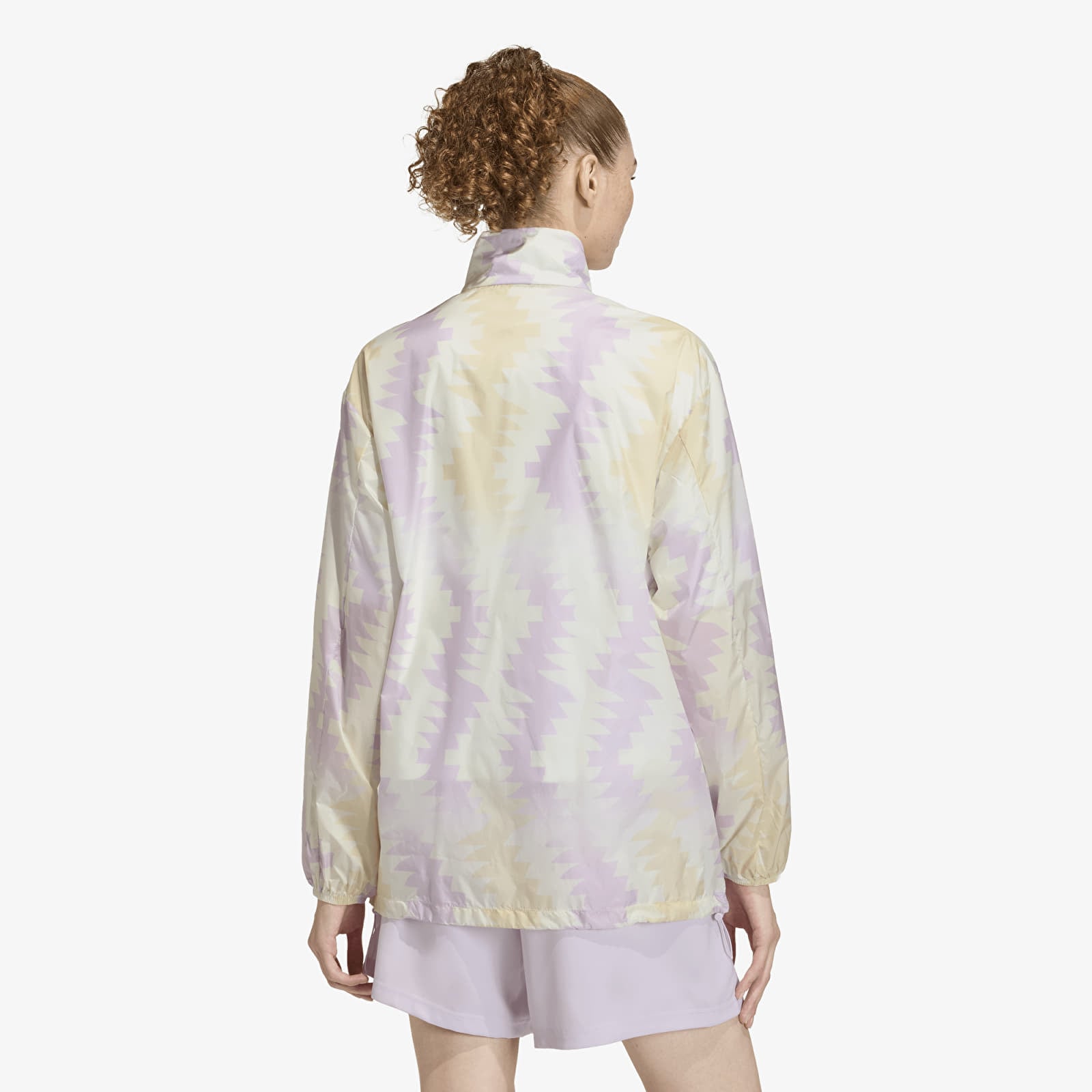 Női kabátok adidas House Of Tiro x Common Goal AOP Windbreaker Wonder White/ Off White/ Ice Lavender