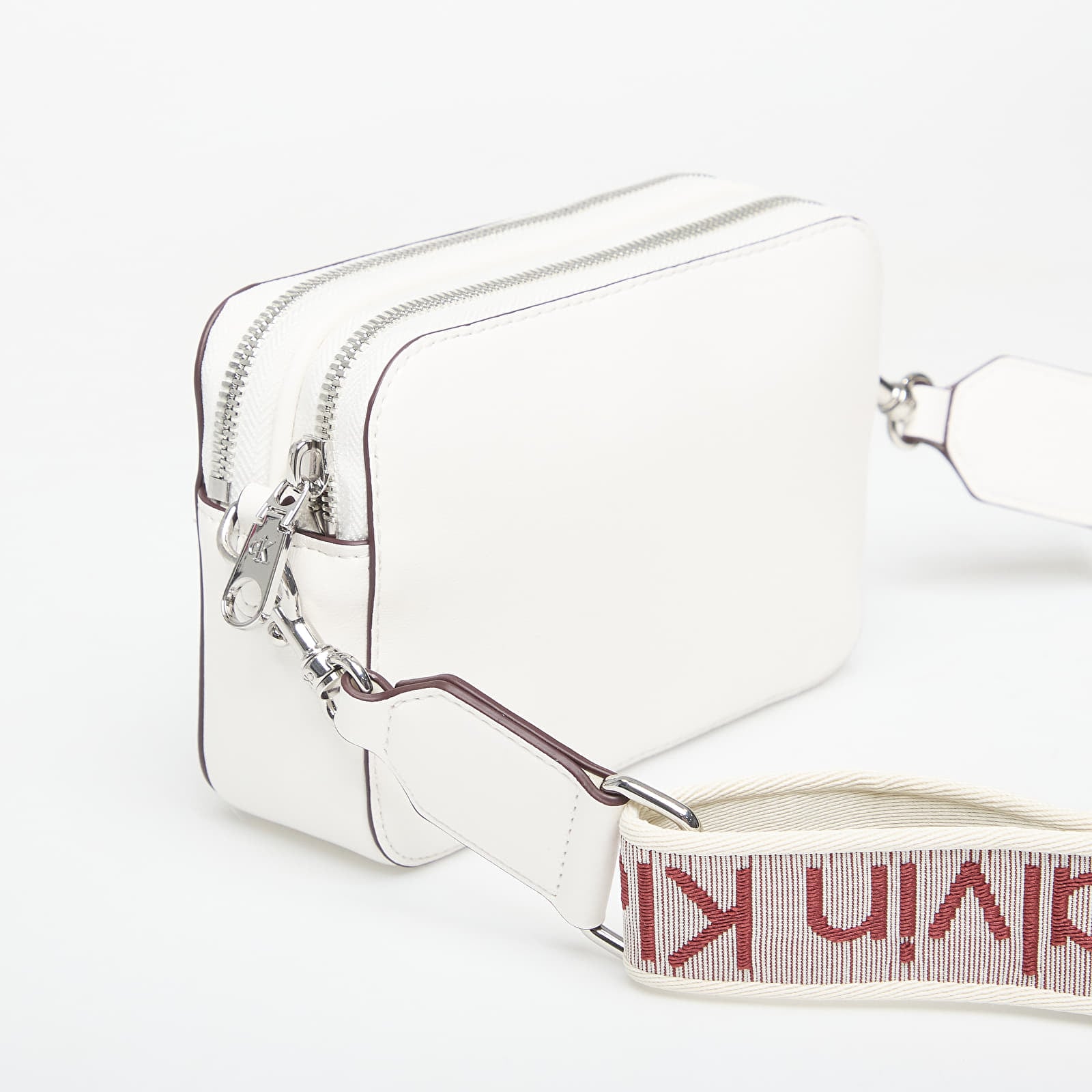 Torebki Calvin Klein Webbing Double Strap Camera Bag White Alyssum