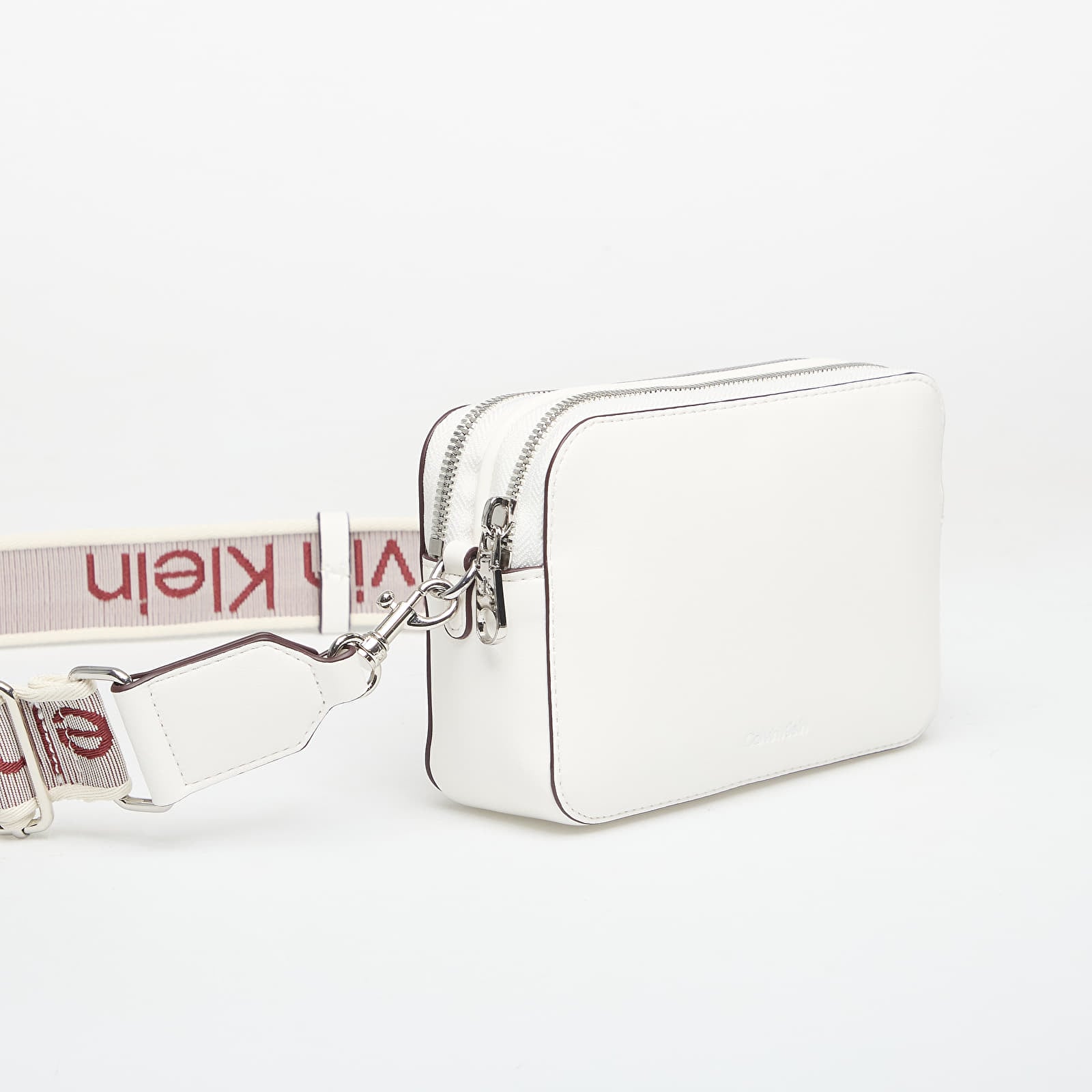 Torebki Calvin Klein Webbing Double Strap Camera Bag White Alyssum