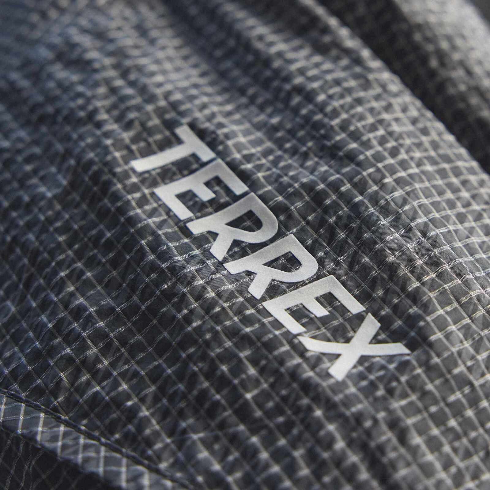 Men's windbreakers adidas Xpl Wind Aop Grey Six/ Carbon/ Black