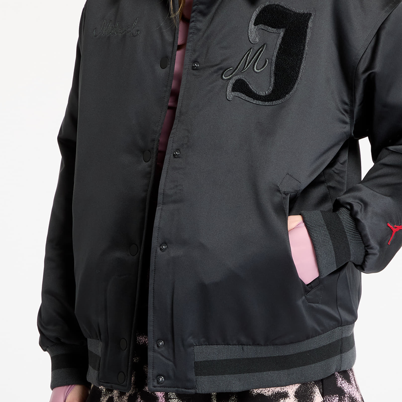 Giacche da donna Jordan Women's Varsity Jacket Black/ Gym Red