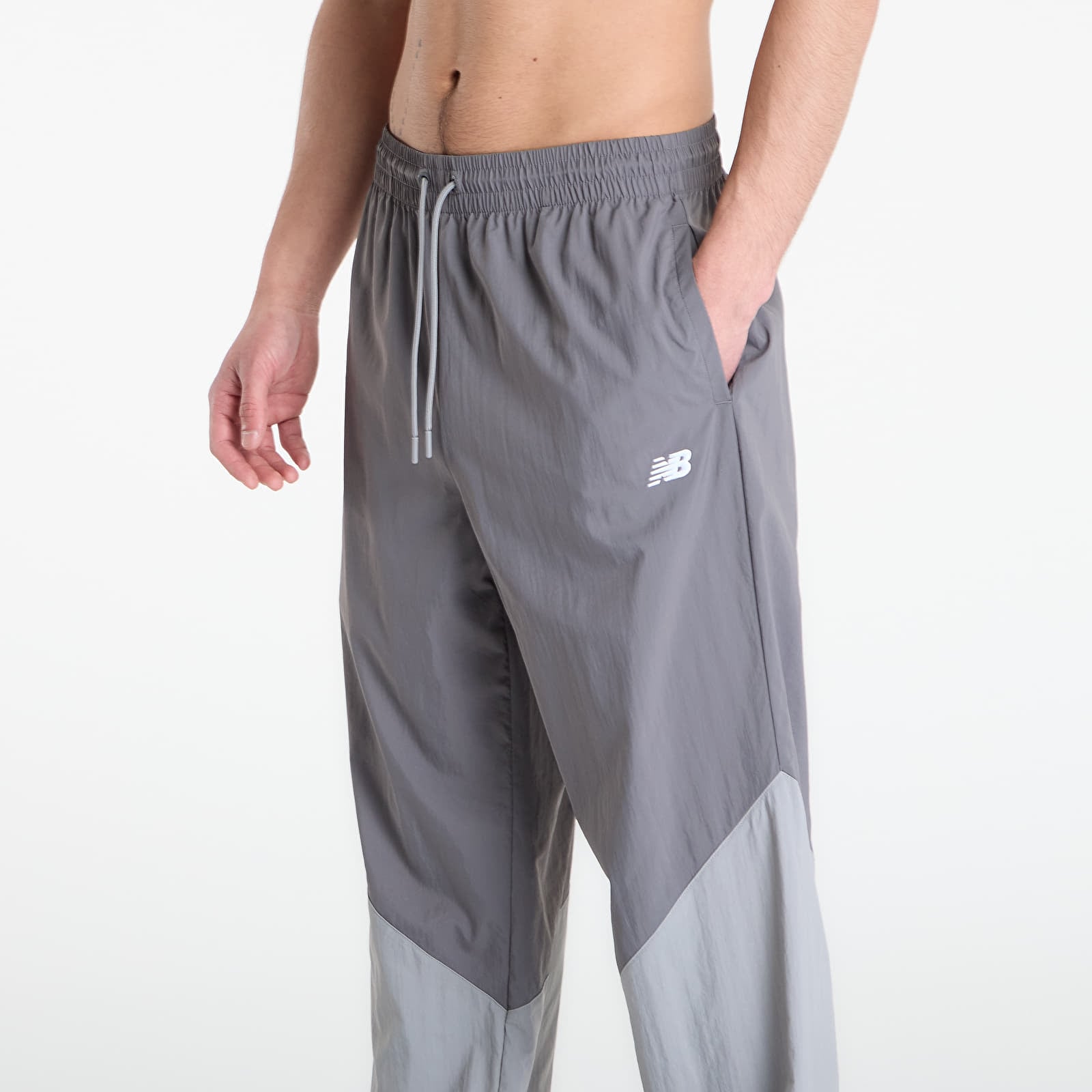 Pánské kalhoty New Balance Sport Legacy Pant Grey