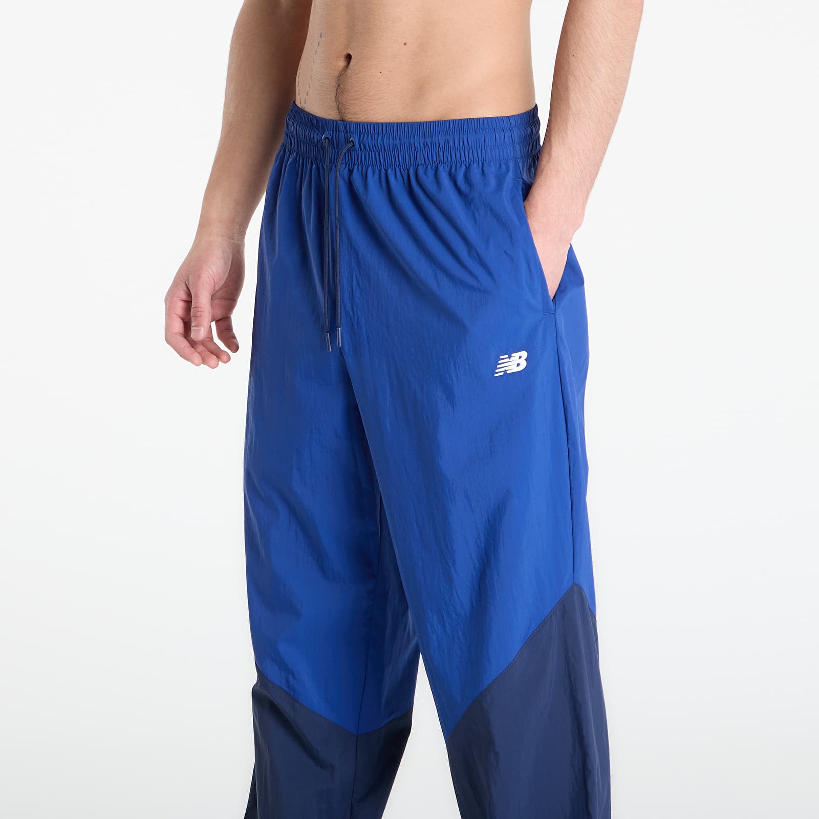 Men's trousers New Balance Sport Legacy Pant Blue