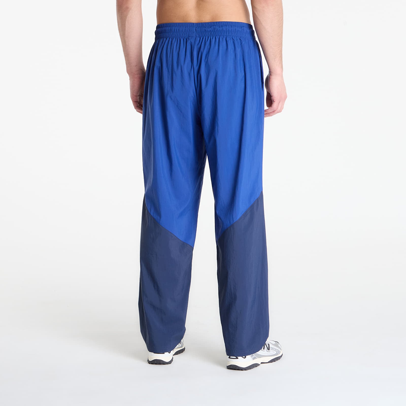 Men's trousers New Balance Sport Legacy Pant Blue