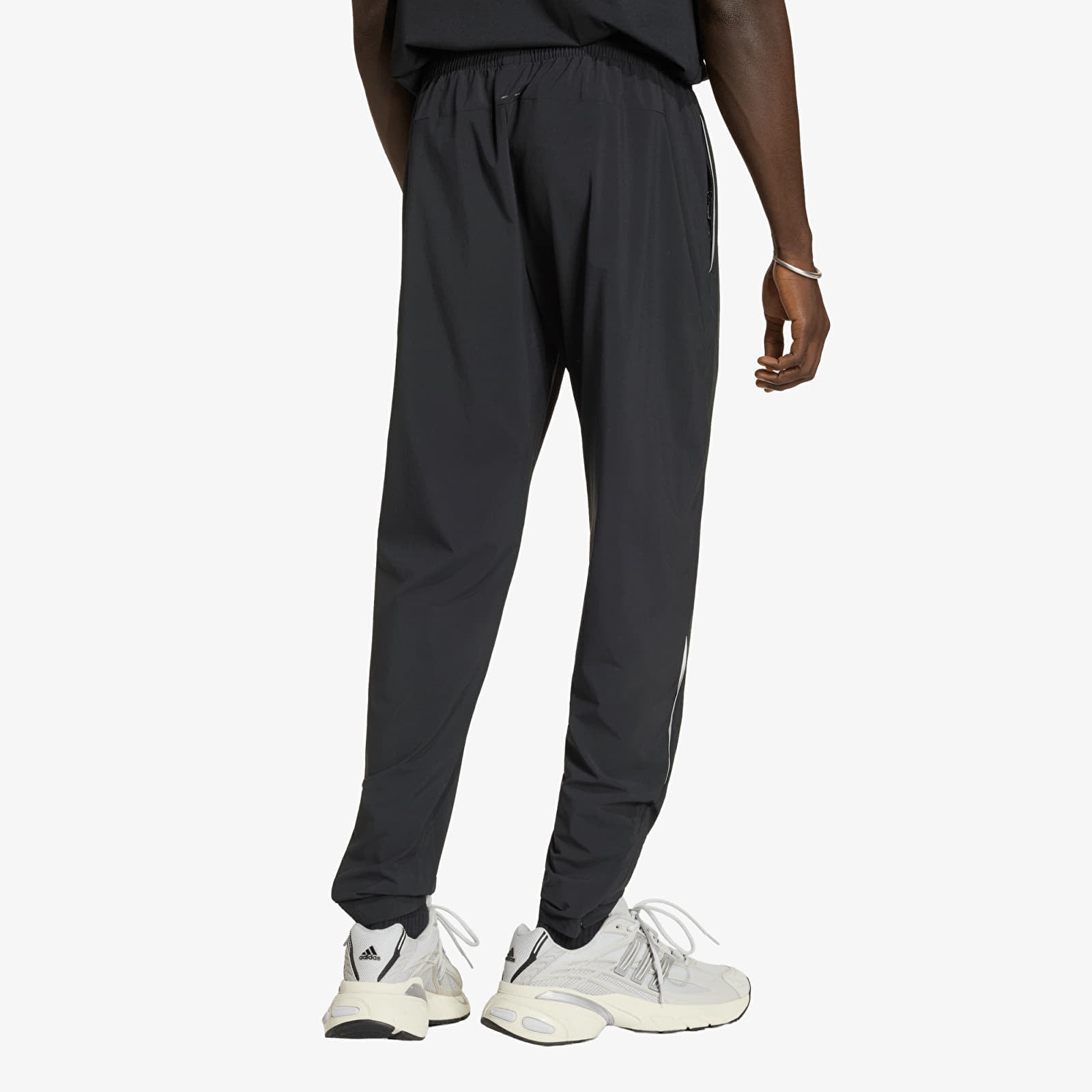 Byxor för män adidas Tech Trefoil Essentials Woven Pant Black