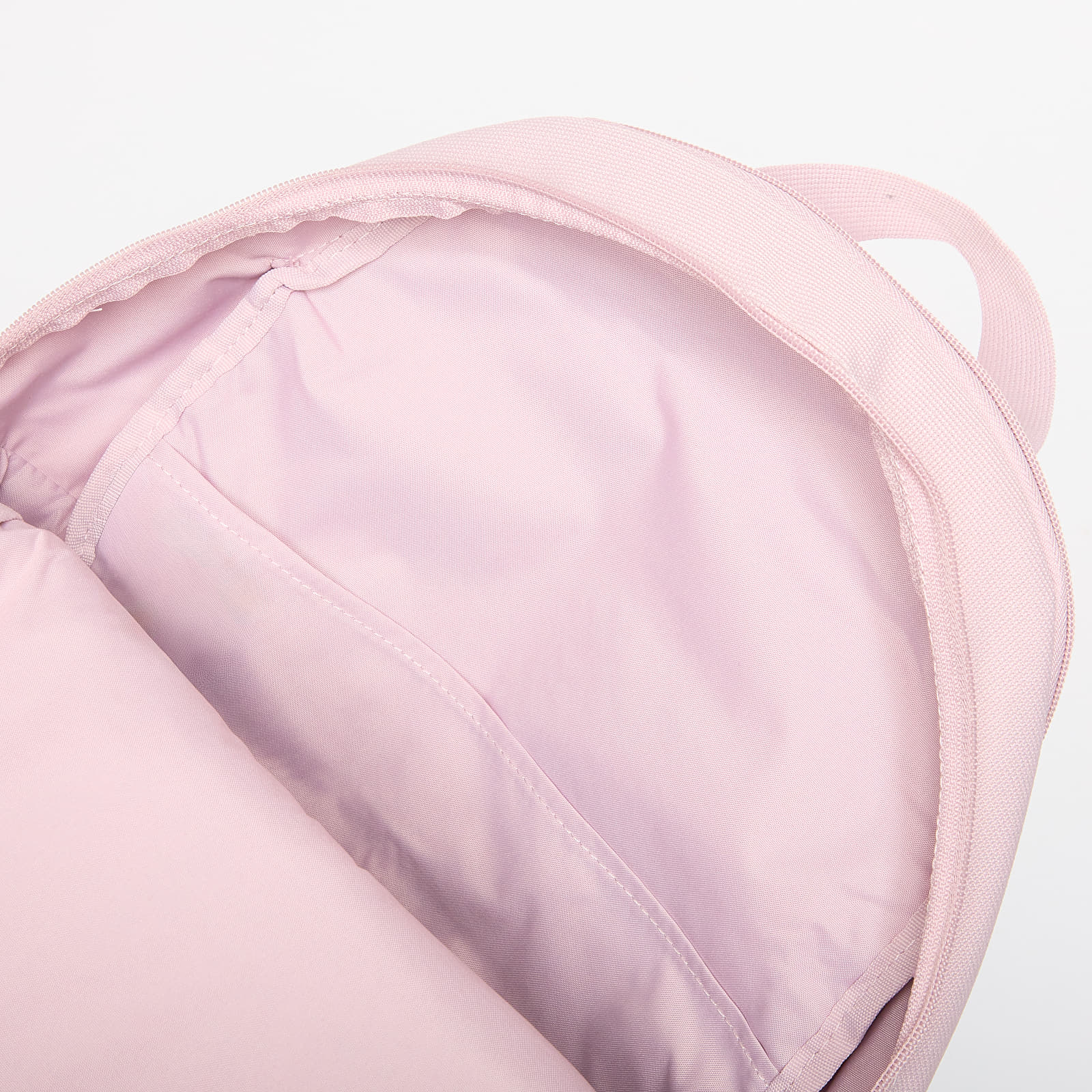 Pánské batohy Nike Heritage Eugene Backpack 20L Particle Rose/ Particle Rose