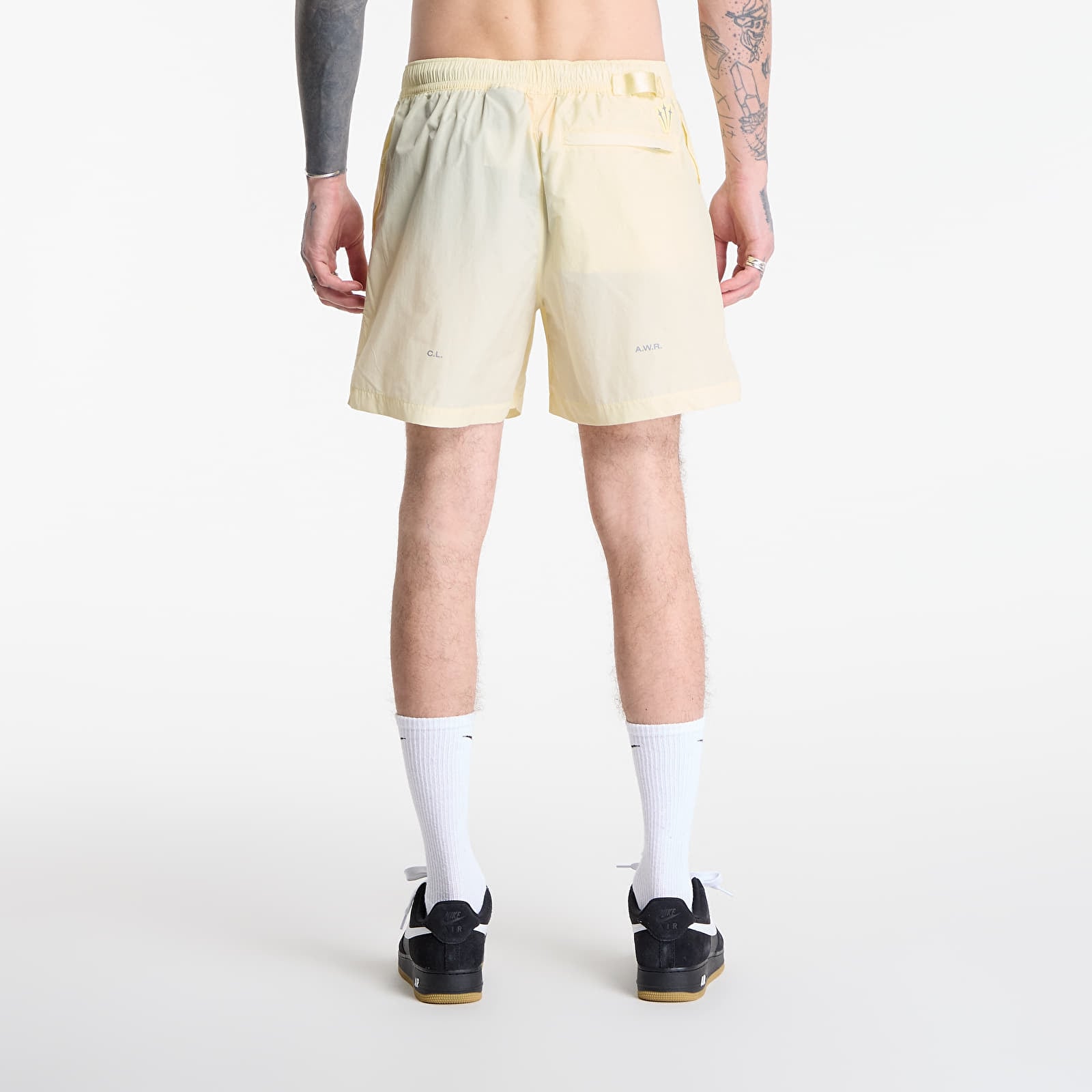 Pantaloncini uomo Nike x NOCTA Cardinal Nylon Shorts Alabaster/ Stealth