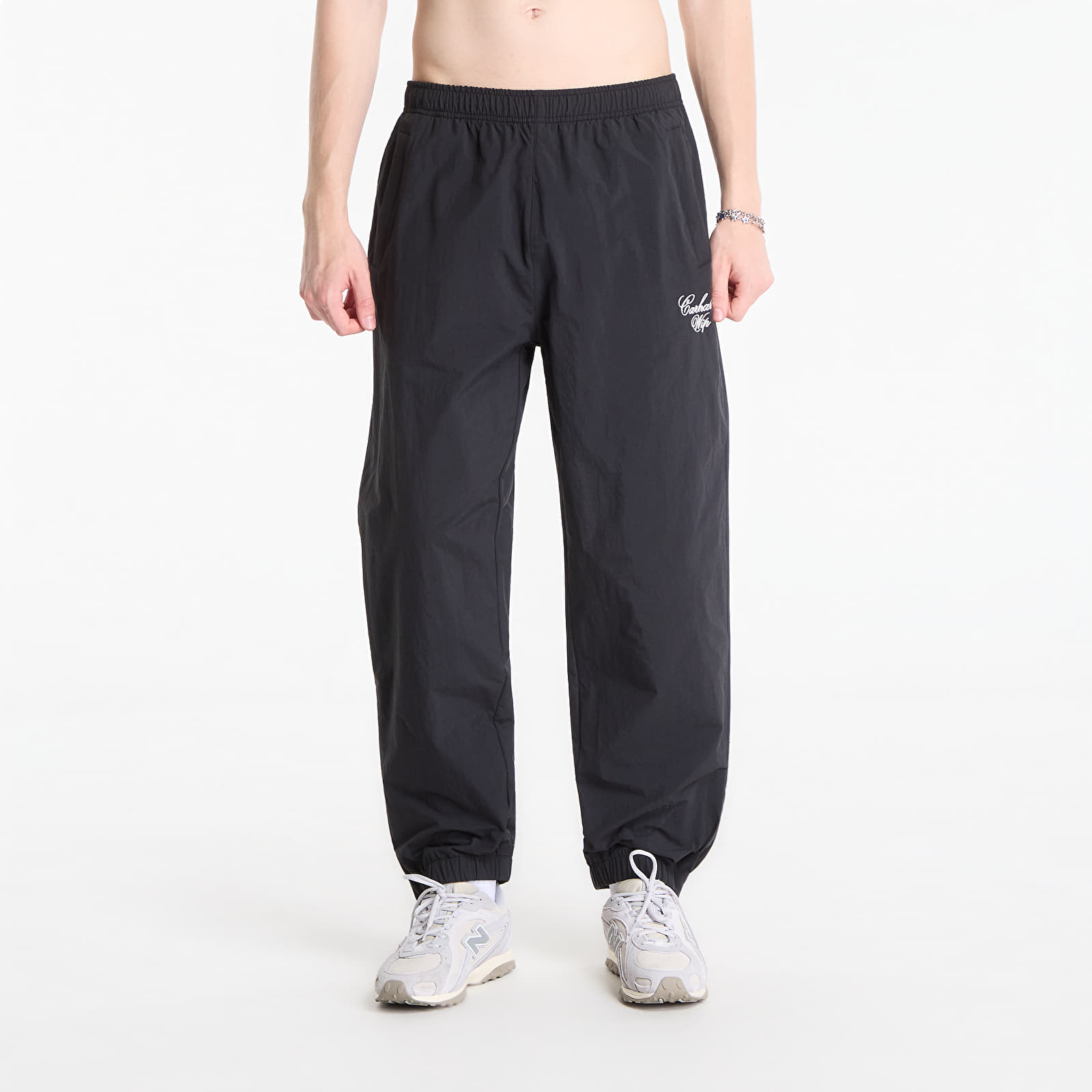 Herren-Sweatpants Carhartt WIP Travon Pant UNISEX Black/ Wax