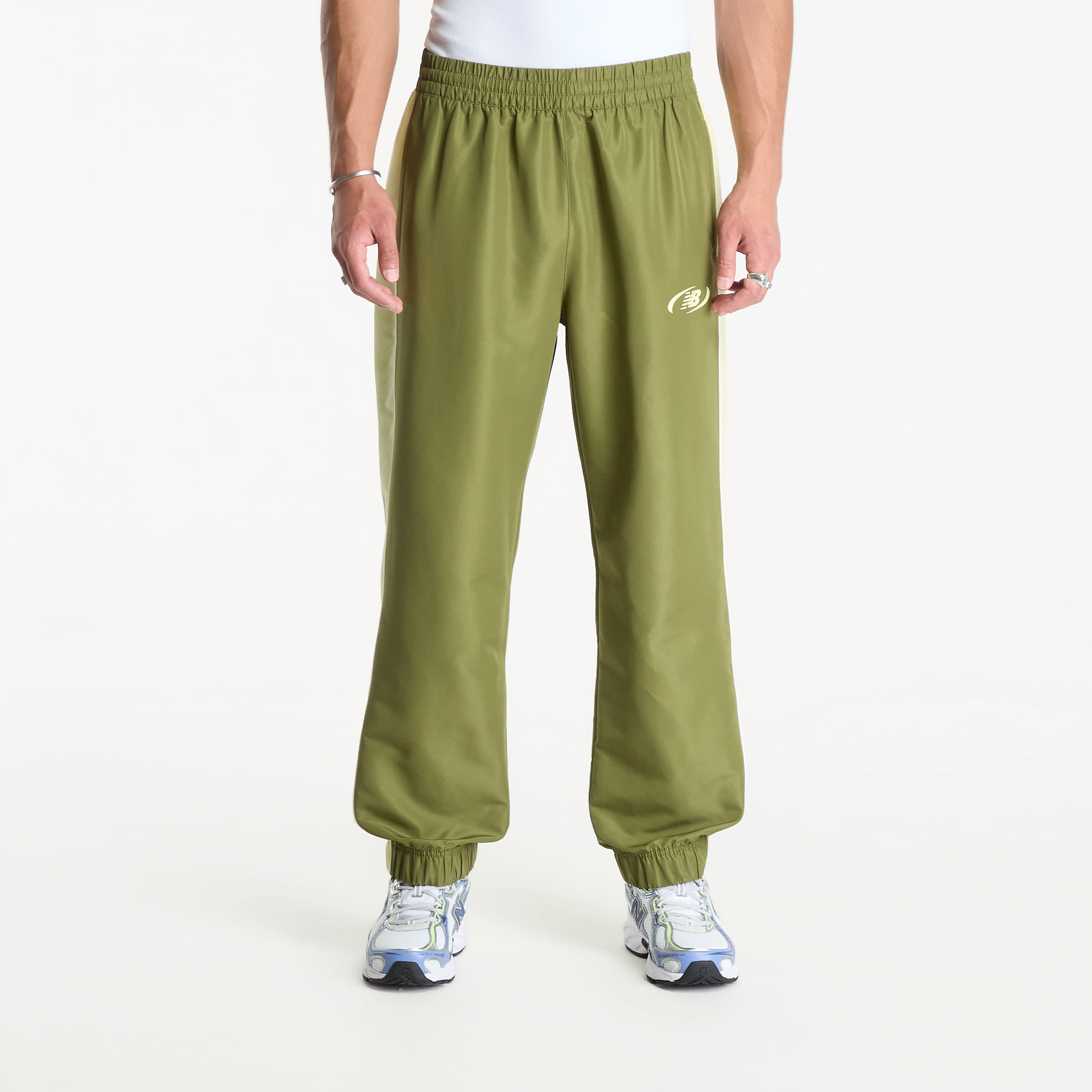 Παντελόνια New Balance Trackside Woven Pant Sport Green/ Fennel Seed M