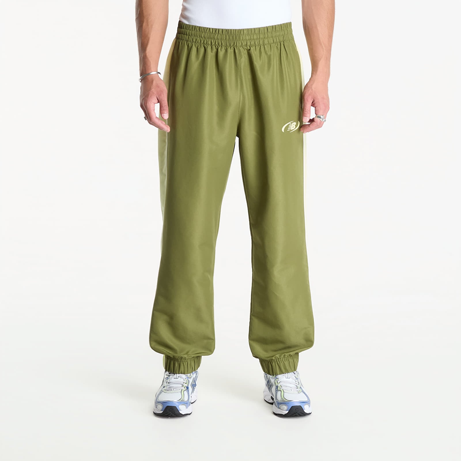 Bukser for menn New Balance Trackside Woven Pant Sport Green/ Fennel Seed