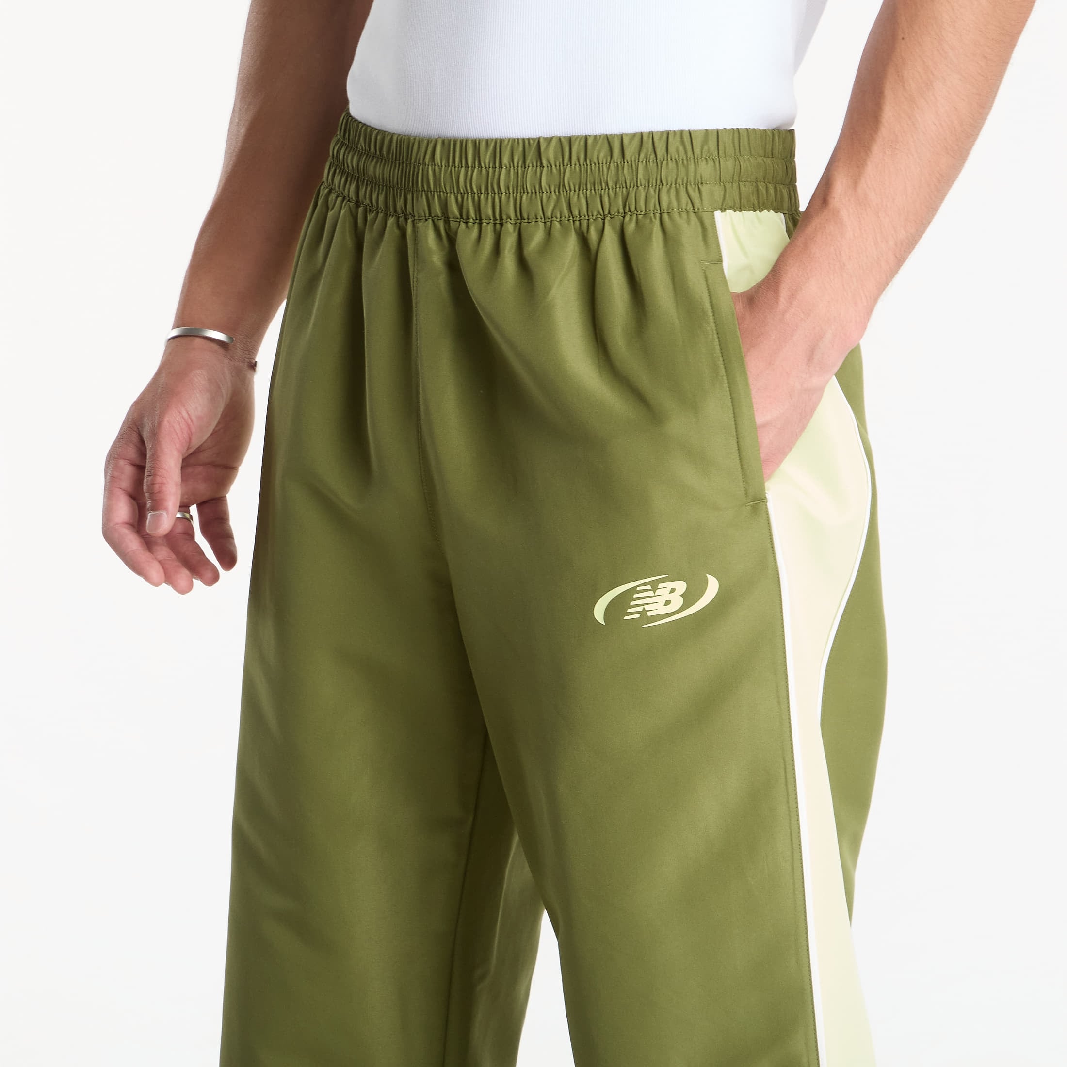 Παντελόνια New Balance Trackside Woven Pant Sport Green/ Fennel Seed XL