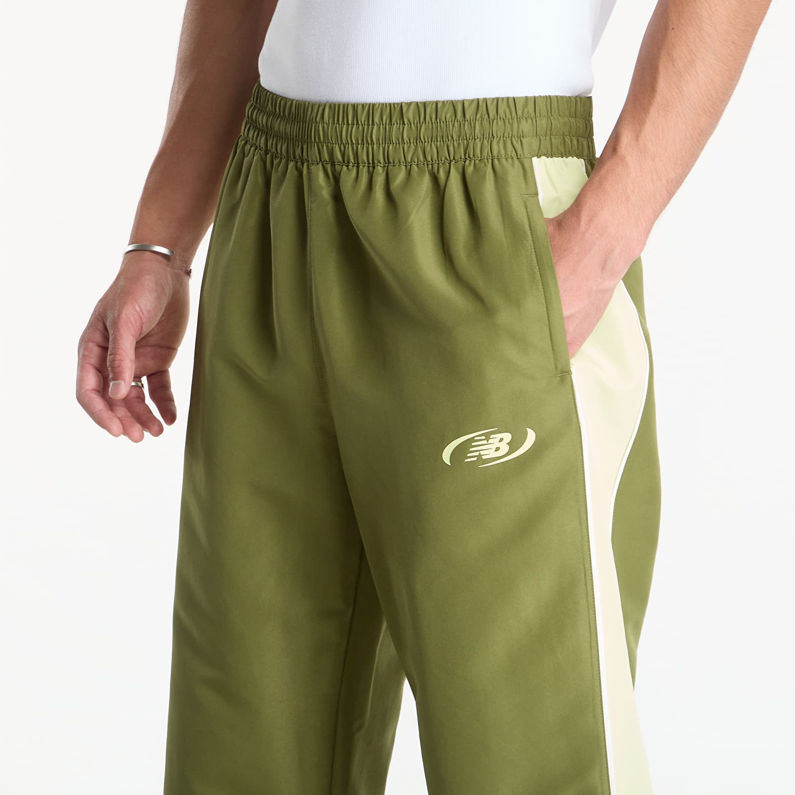 Bukser for menn New Balance Trackside Woven Pant Sport Green/ Fennel Seed