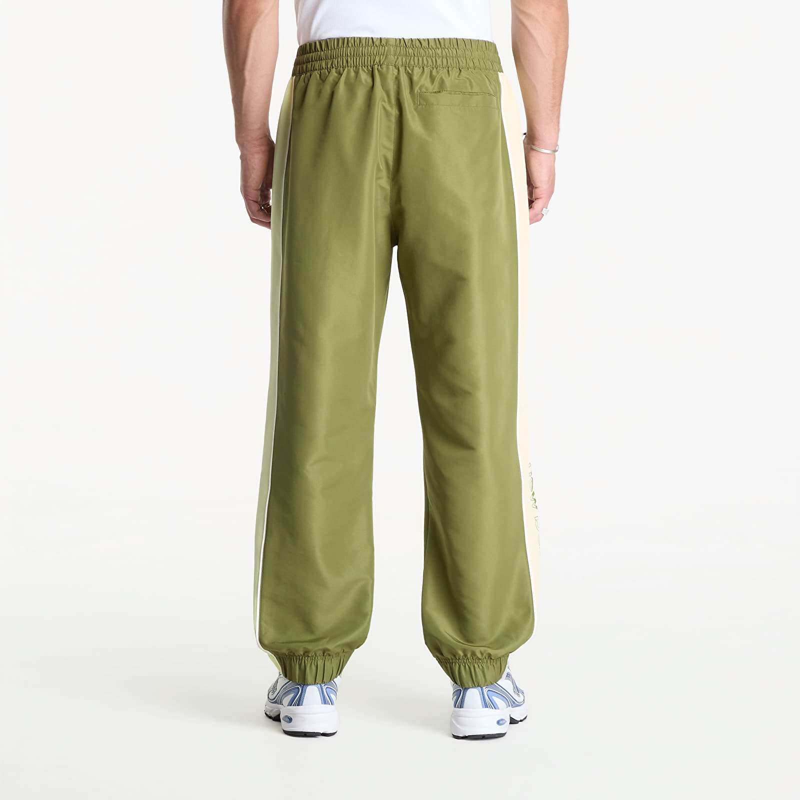 Bukser for menn New Balance Trackside Woven Pant Sport Green/ Fennel Seed