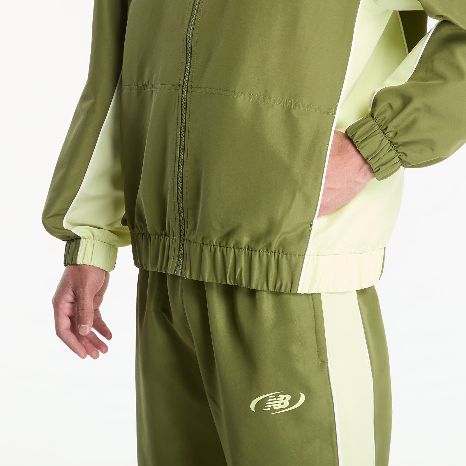 Pánské bundy New Balance Trackside Woven Jacket Sport Green/ Fennel Seed