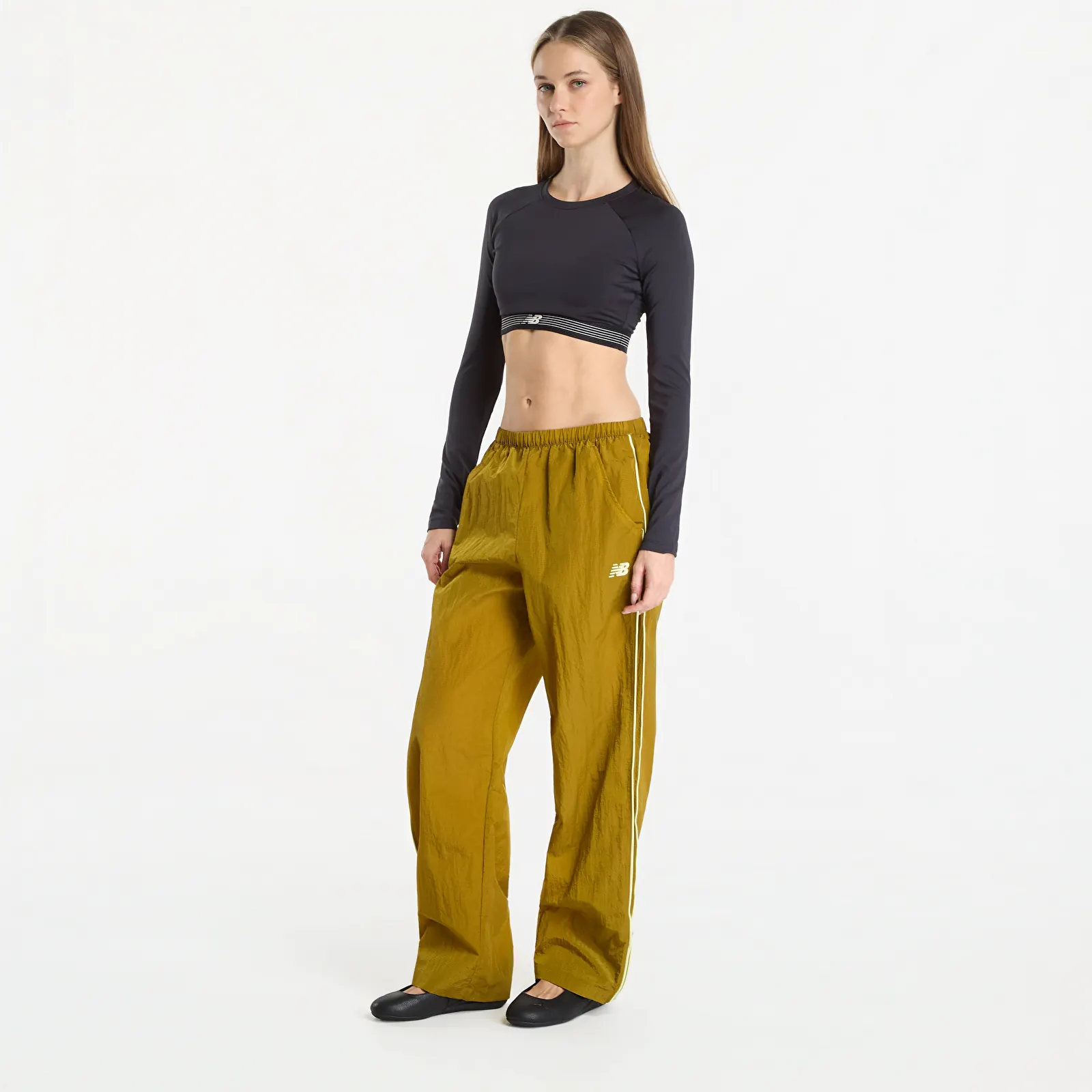 Hosen für Frauen New Balance Sport Legacy Pant Basil Oil