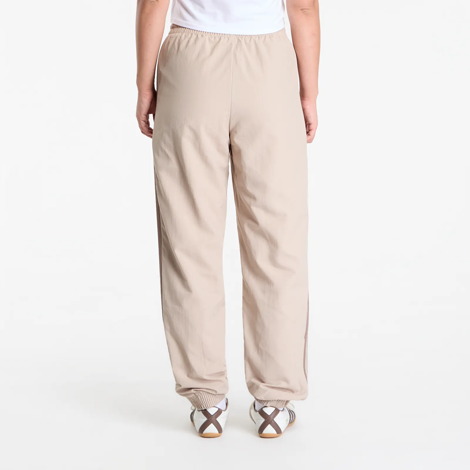 Pánske tepláky adidas Firebird Woven Pants UNISEX Khaki Three