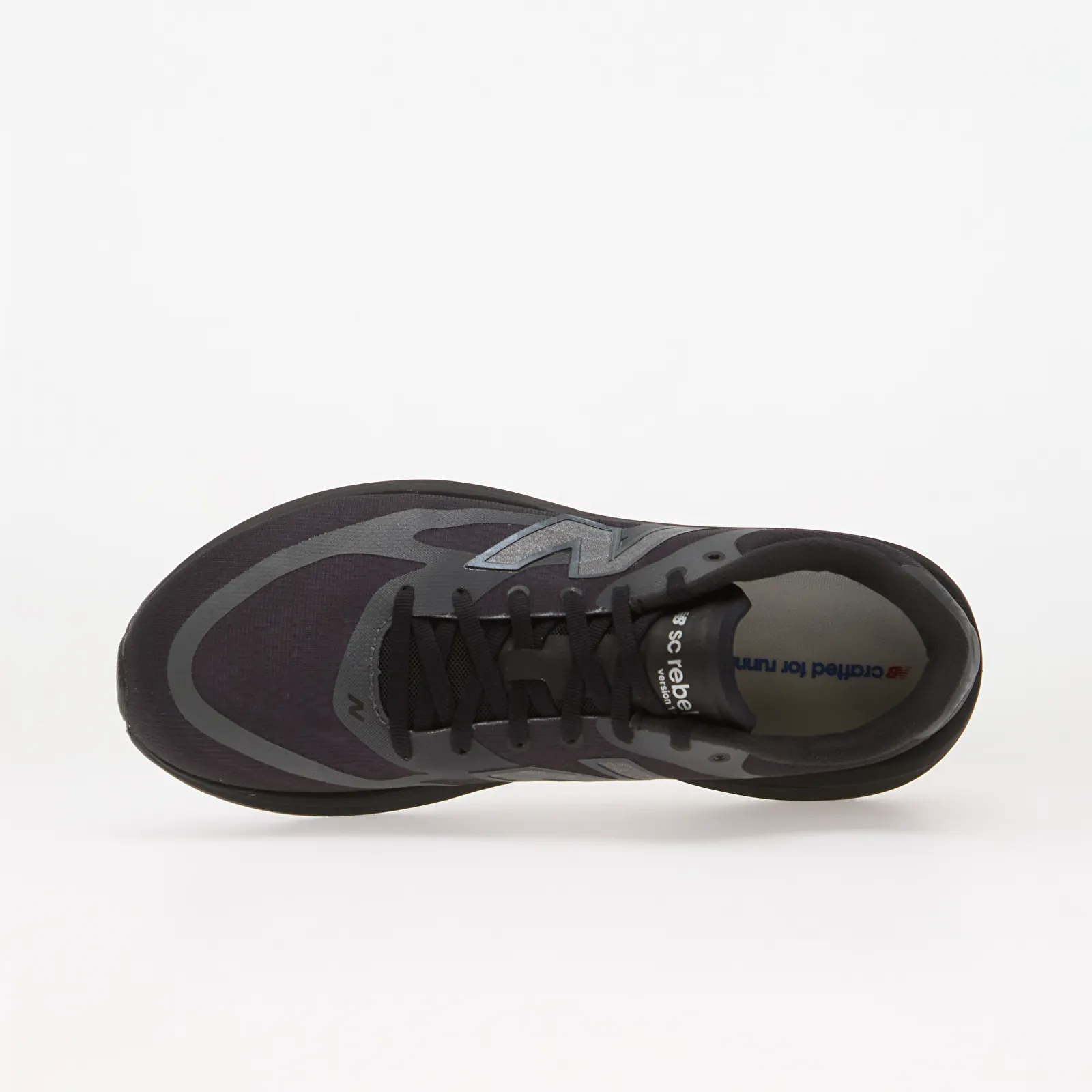 Herenschoenen New Balance SuperComp Rebel v1 Black/ Magnet