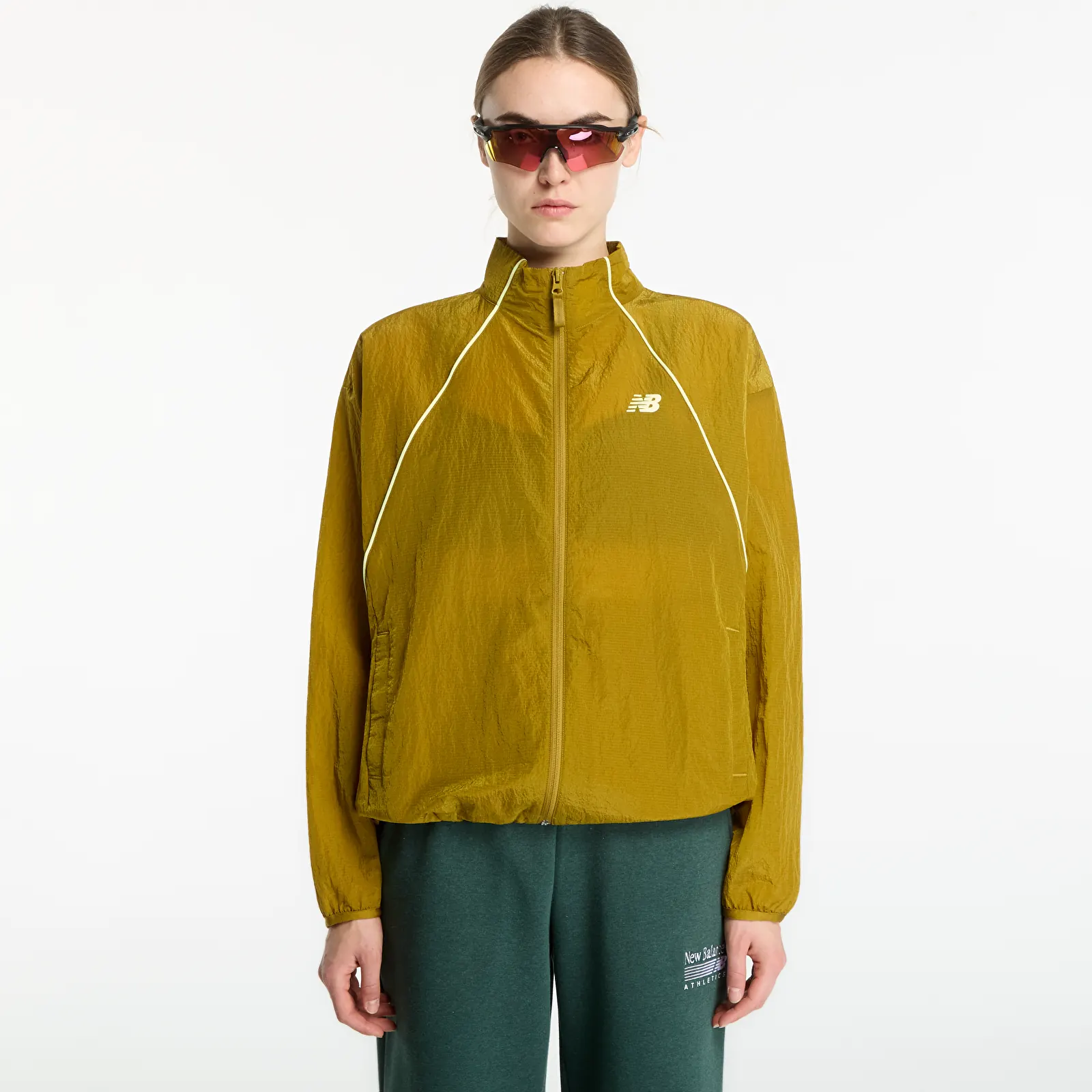 Dámske vetrovky New Balance Sport Legacy Jacket Basil Oil